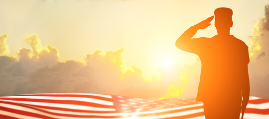 Soldier and USA flag on sunrise background .Concept National holidays , Flag Day, Veterans Day,...