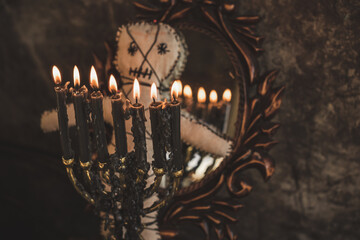 Voodoo Magic. Witchcraft with a doll. Concept of magic.