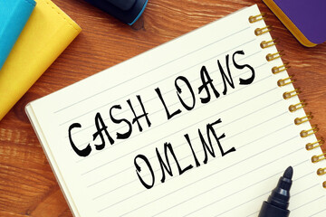 Business concept about CASH LOANS ONLINE question marks with inscription on the page.