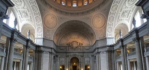 Breathtaking Beaux-Arts architecture and baroque stucco interiors inside San Francisco City Hall...