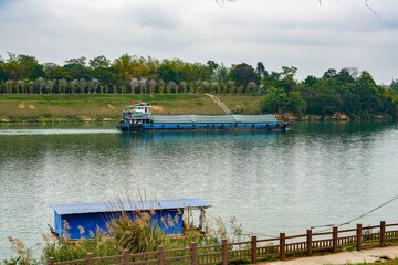 A large sand mining ship in the river