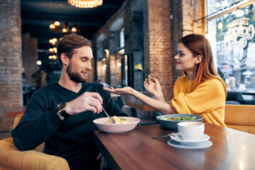 cheerful young couple communication restaurant leisure lifestyle