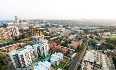 Obraz premium High Angle view of Sandton Central Business District buildings and roads