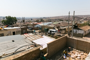 Obraz premium High Angle rooftop view of low income houses in Alexandra township Johannesburg South Africa