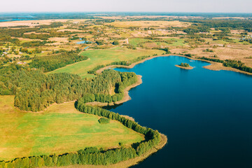Obraz premium Braslaw District, Vitebsk Voblast, Belarus. Aerial View Of Nedrovo Lake, Green Forest Landscape. Top View Of Beautiful European Nature From High Attitude. Bird's Eye View. Famous Lakes
