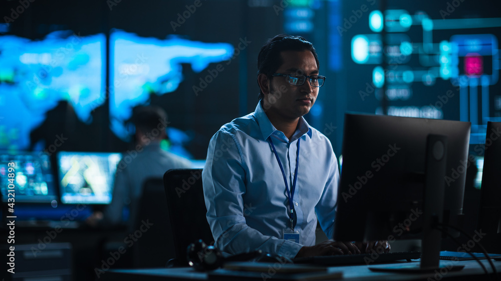 Poster Professional IT Technical Support Specialist and Software Developer Working on Computer in Monitoring Control Room with Digital Screens with Server Data, Blockchain Network and Surveillance Maps. 