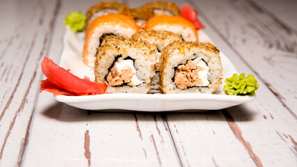 Shui rolls on a white plate close-up, copy space, template