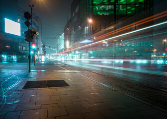 Intersection in the city on a rainy evening - obrazy, fototapety, plakaty