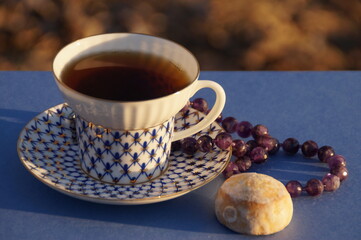 a cup of tea with gingerbread