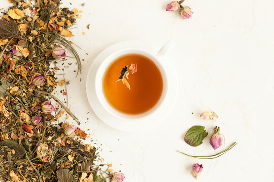 fragrant herbal tea in a white mug, herbal tea for a healing drink.
