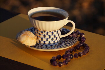 a cup of tea with gingerbread