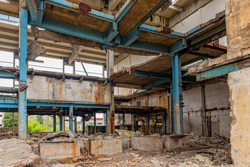 Fototapeta na wymiar Abandoned the oldest sugar factory in Serbia. The abandoned factory buildings are in the municipality of Padinska Skela in Belgrade, Serbia.