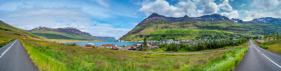 Fototapeta na wymiar Panoramic view over Seydisfjordur small town in eastern Iceland, and beautiful fjords around, Iceland, summer.