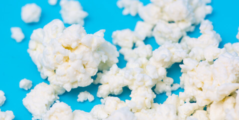 Milk curd on a blue background.