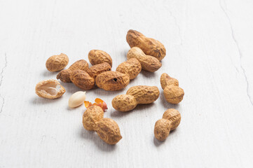 peanuts in a shell on a light background