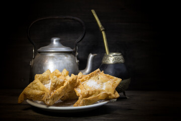 fried quince and sweet potato pastries with mate