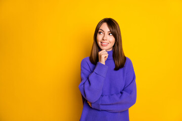 Photo of cute clever young woman wear purple pullover arm chin looking empty space isolated yellow color background