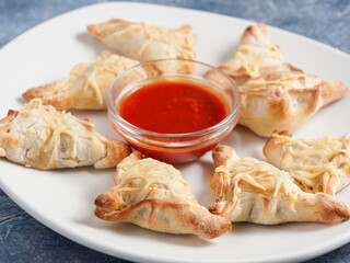 sambusa or samosa traditional Oriental and Asian pies with filling