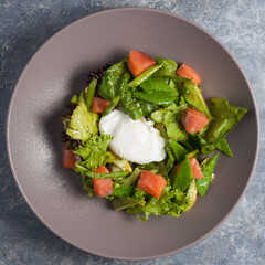 salad with avocado, salmon, string beans. Top view