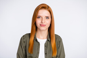 Fototapeta premium Portrait of attractive cheery content red haired girl wearing casual isolated over white light color background