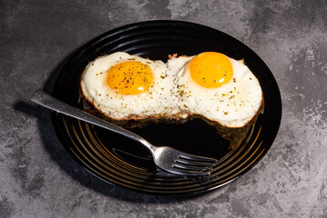 fried eggs, delicious breakfast, snack, yolk and protein food, background, top view, copy space, eat healthy raw. Scrambled eggs. Close-up