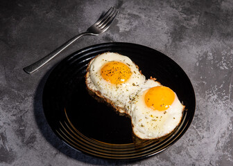 fried eggs, delicious breakfast, snack, yolk and protein food, background, top view, copy space, eat healthy raw. Scrambled eggs. Close-up