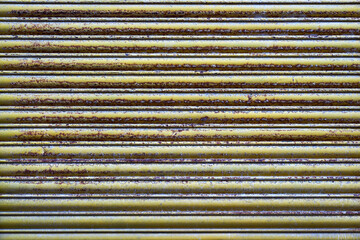 Horizontal Lines of Rusty Metal Shutters 