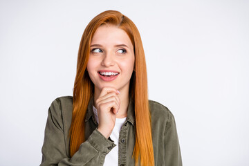 Photo of cheerful red hair lady look empty space wear grey shirt isolated on white color background