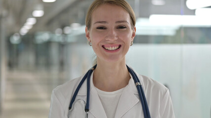Fototapeta premium Smiling Female Doctor Looking at Camera 