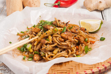 noodles with chicken and vegetables. Asian cuisine