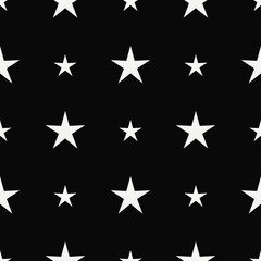 White stars and black background. Vector and seamless stars pattern.