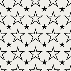 Large white stars and small black stars. Vector ornament and seamless stars pattern.