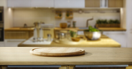 Fototapeta premium Table background of free space and kitchen interior 