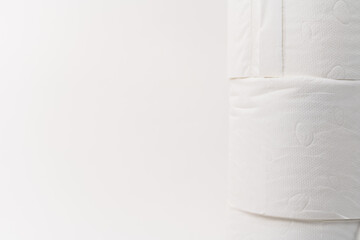 roll of toilet paper on the right on white