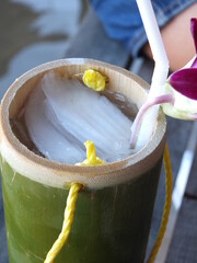 Coconut water in bamboo tubes