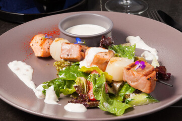 kebab or skewer made from salmon, tuna and scallop