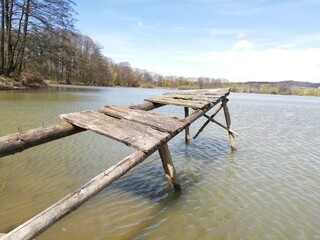 wooden bridge over the lake