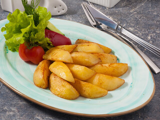 tasty fried potato slices with vegetable dressing