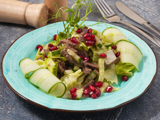 salad with beef cucumber and pomegranate seeds