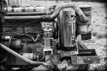 Old tractor engine. Black and white.