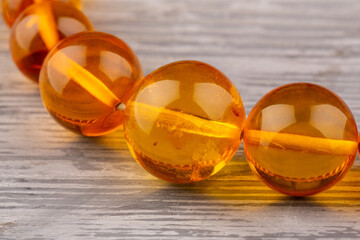 A set of natural lemon amber with inclusions, in each bead - particles of flora and fauna -...