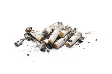Cigarette stubs, butts in ash pile isolated on white background, top view