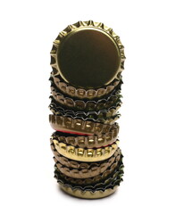 Metal beer bottle caps pile isolated on white background