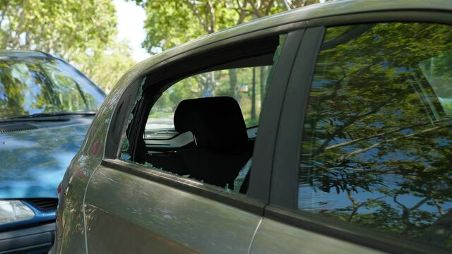 Theft from a parked car, intruders broke the rear window in search of valuables left in the car. Small rented vehicle left at city park unattended for a long time