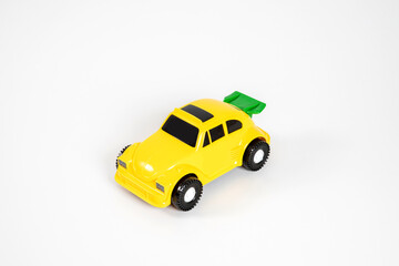 Toy plastic car isolated on white background.