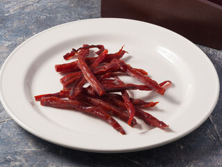 sticks of dried pink salmon-a snack for beer