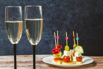 Champagne in a glass on a dark background