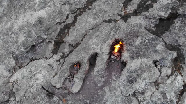 Aerial Shot of Geological feature on the Yanartas Chimera mountain in Turkey on the slope of which natural gas burns continuosly