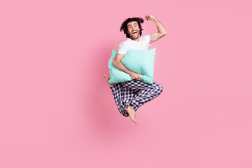 Full size photo of happy funky funny smiling man jumping in victory success triumph isolated on...