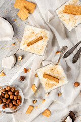coconut dessert in glass with cookies